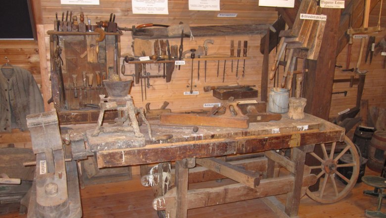 Niederleis local history museum, © Heimatmuseum Niederleis Old carpentry tools on display in a museum.