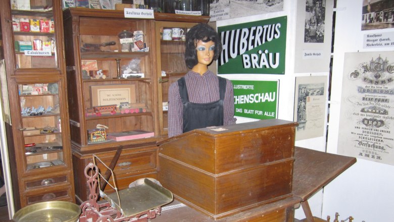 Niederleis local history museum, © Heimatmuseum Niederleis Historic store in the Niederleis local history museum with scales, mannequin and old advertising signs.