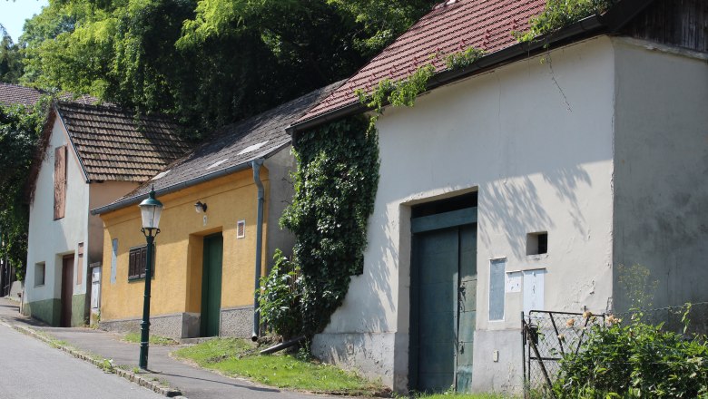 Wine cellar lane with old buildings and lantern in Bisamberg.
