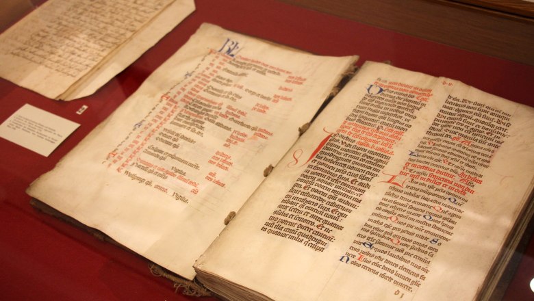 Old manuscripts in a display case in the Stockerau District Museum.