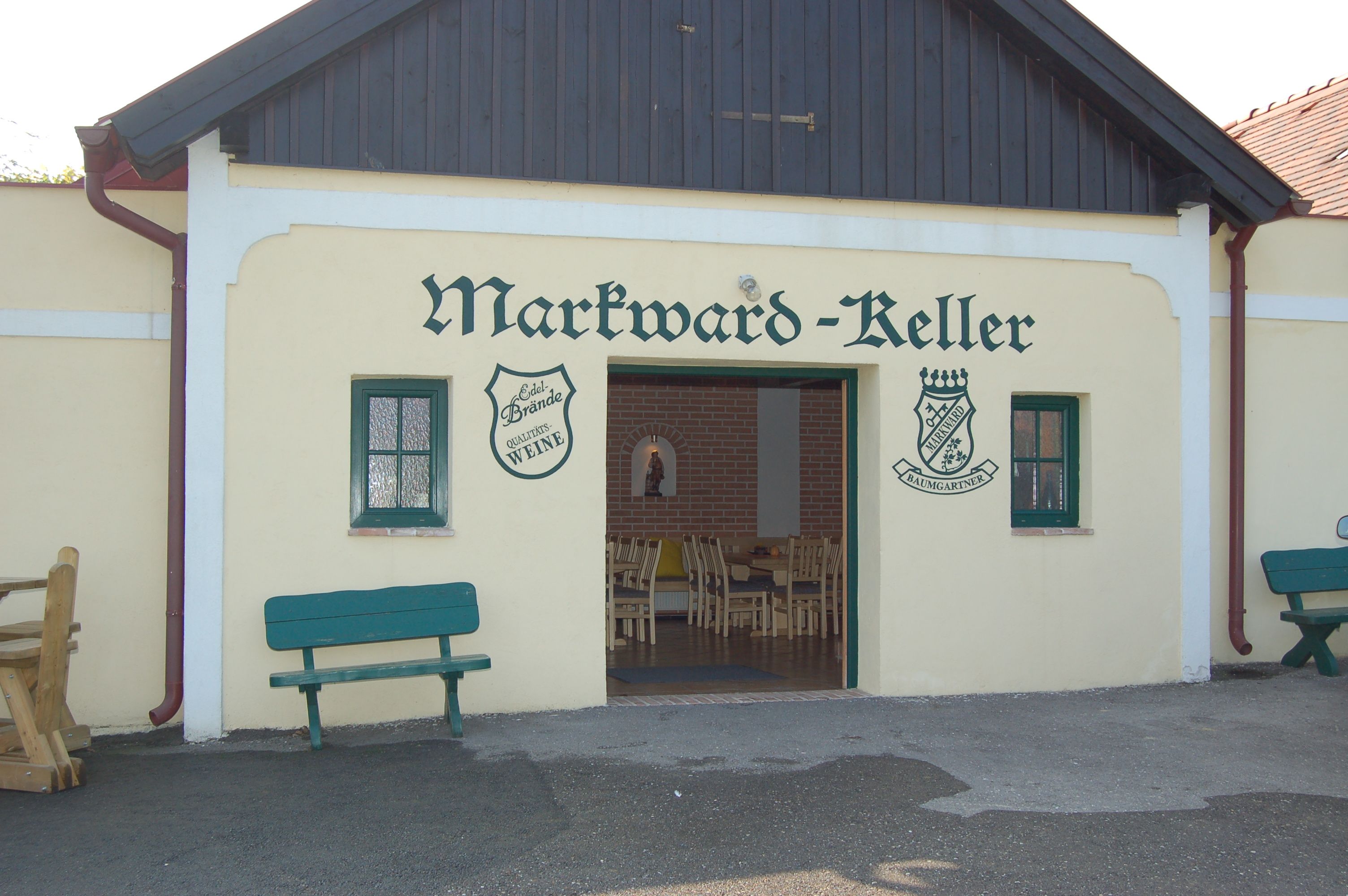 Entrance to the Markward cellar with benches and open gate.