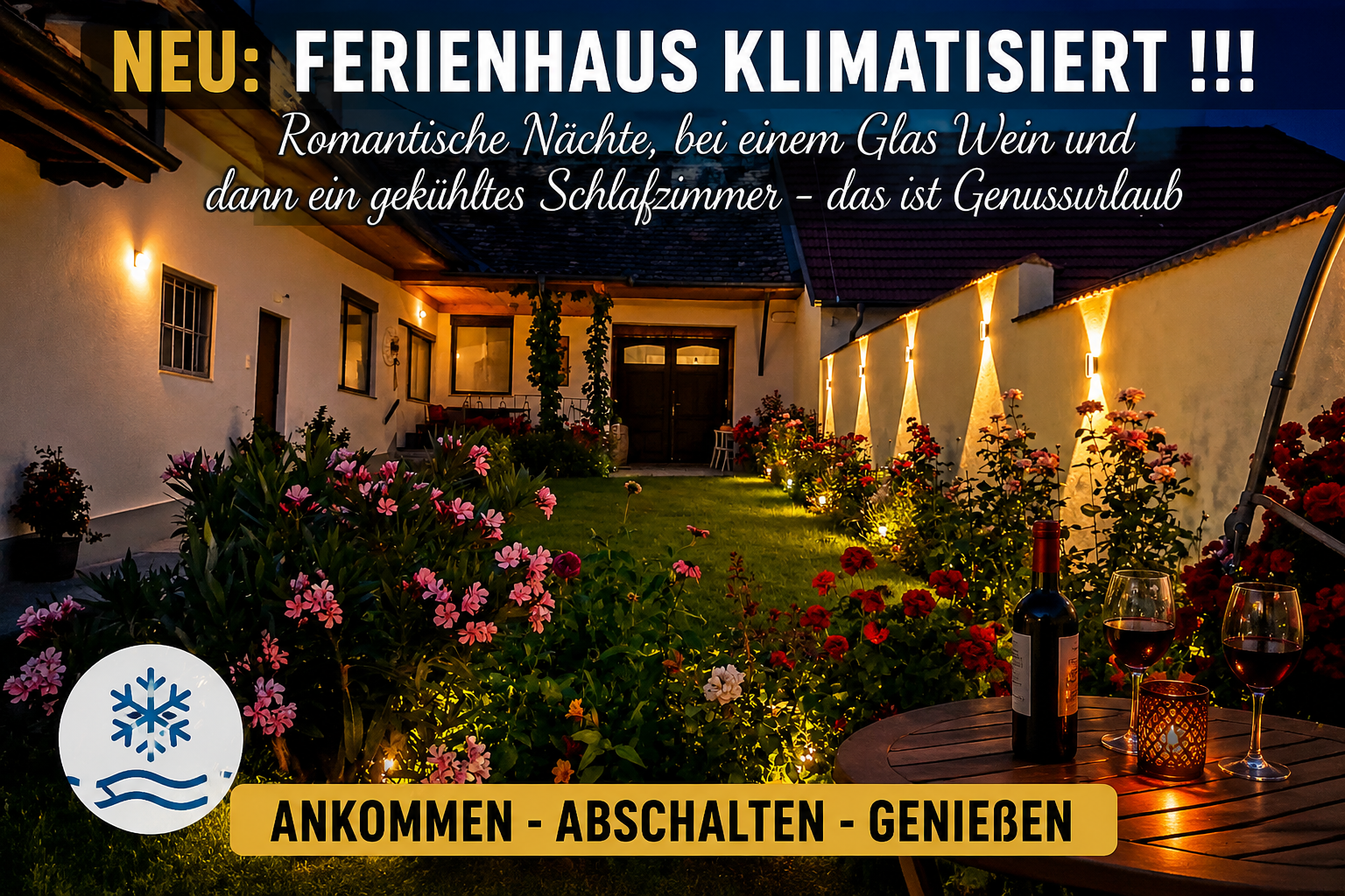 Ein beleuchteter Garten eines Ferienhauses mit Blumen und einem Tisch mit Weinflaschen und Gläsern.